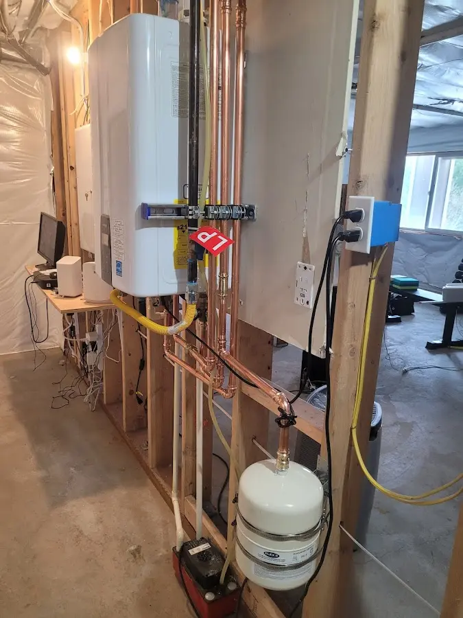 Licensed plumber repairing a kitchen sink in River Oaks